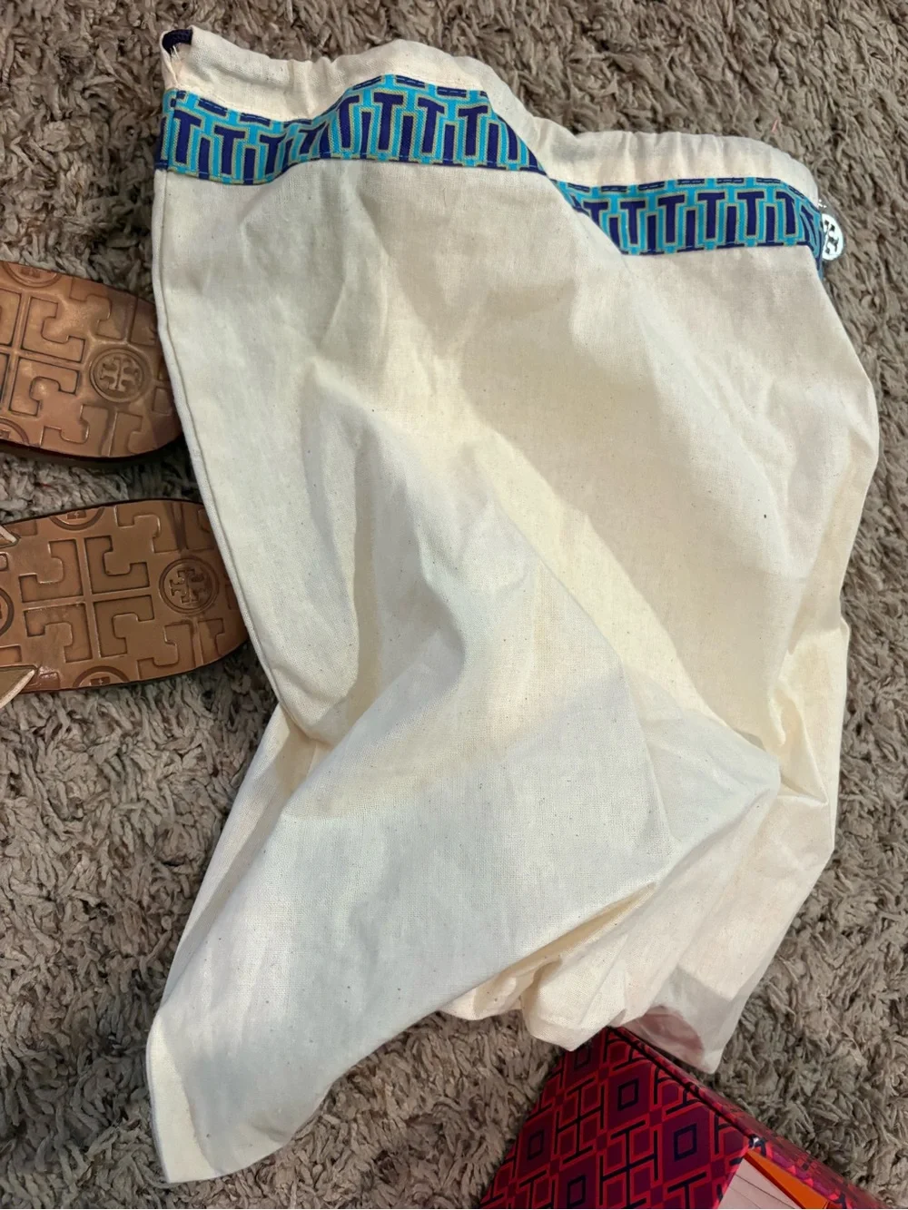 Tory Burch Thora Cream Leather Logo Thong Sandals with Gold Emblem